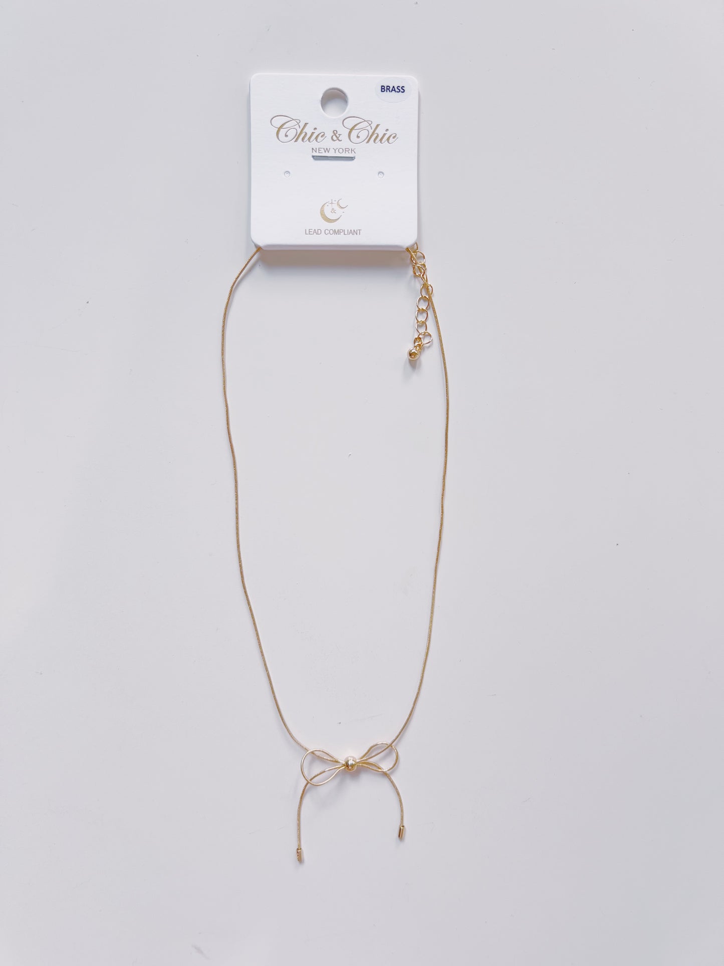 Gold Snake Chain Bow Necklace