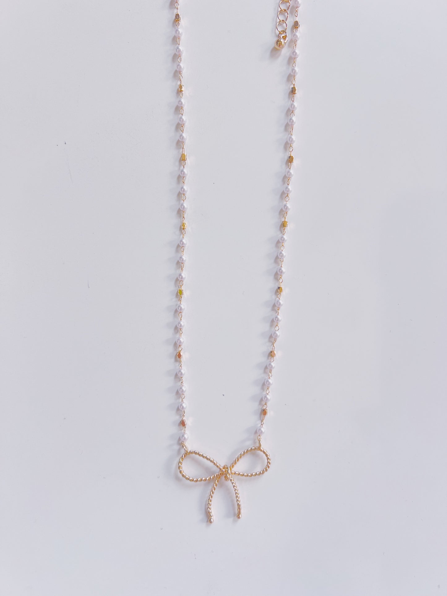 Gold Textured Bow & Pearl Chain Necklace