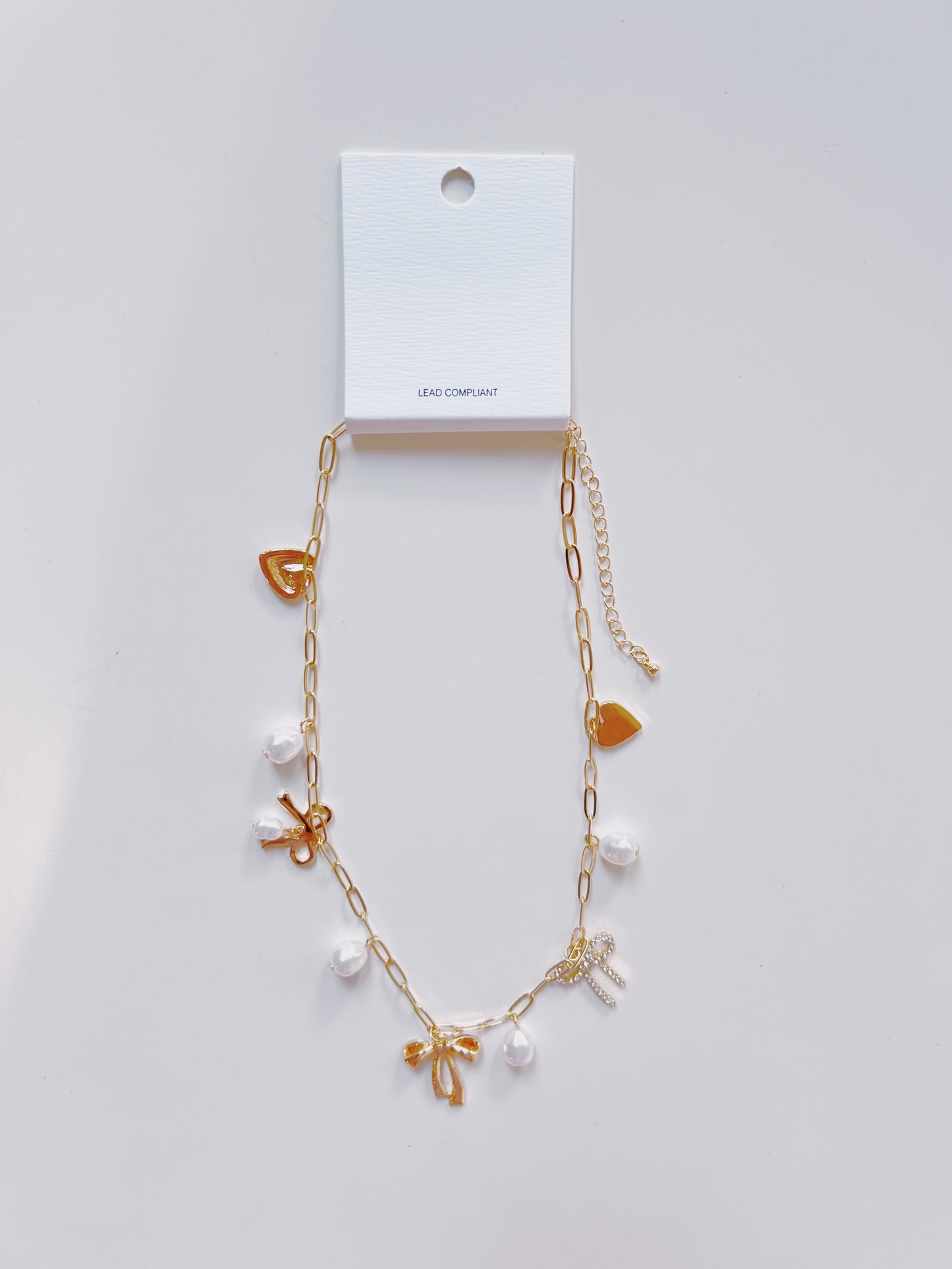 Gold Bow & Heart Multi Charm Necklace