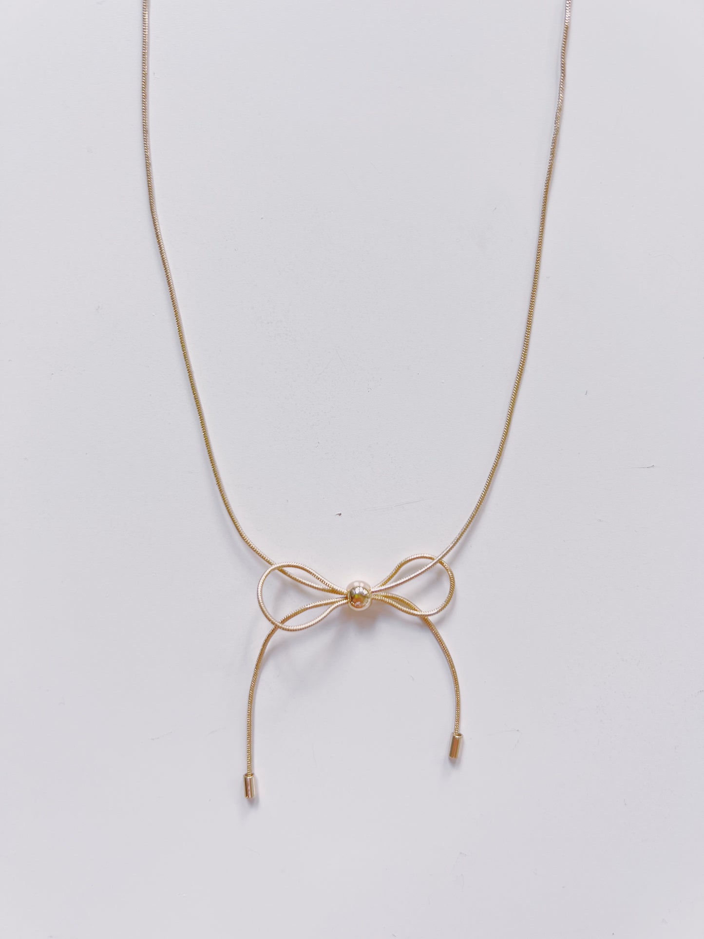 Gold Snake Chain Bow Necklace