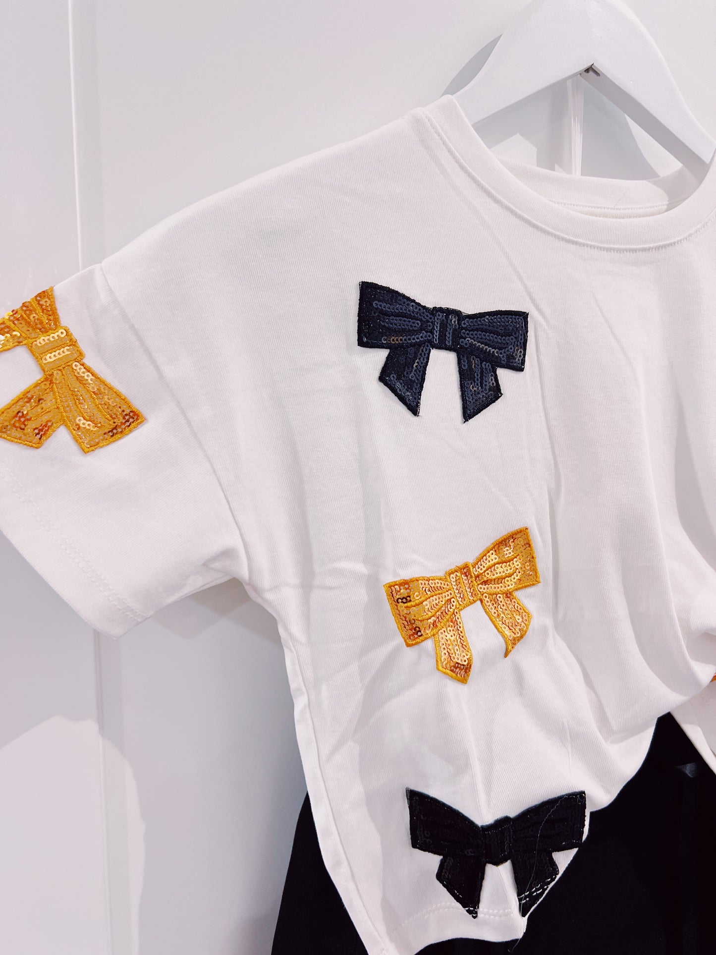 Hayden Black/Gold Sequin Bow Top