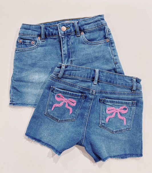 Tractr Indigo Raw Edge Pink Bow Pocket Denim Shorts